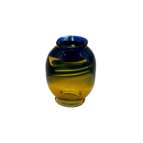 This is the Yellow / Cobalt Color Swirl Glass Macrame Bead by Biting Glass available at Ritual Colorado. Handmade in Denver, CO and featuring vibrant combinations of glass colors these beads are the perfect accent to your project.