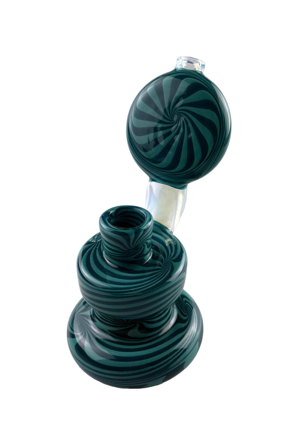 This is the Blueberry Wig Wag Bubbler by Technicolor Tony available at Ritual Colorado. A heady 14mm water piece featuring tons of detailed color work and intricate wig wag patterns.