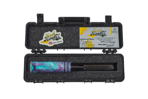 This is the Candy Cosmos dab tool from Hash Handlez available at Ritual Colorado. These beautiful handmade dab tools feature vibrant resin handles and a portective case for easy transportation.