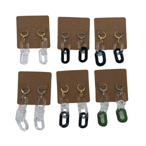 These are a collection of Glass Chain Earrings by Biting Glass available at Ritual Colorado. Featuring vibrant color accents and available in 2 and 3 link lengths these handmade jewelry pieces are the perfect accent accessory.