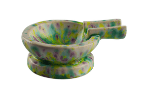 This is the Chartreuse ceramic ash tray from Jaxel's Art available at Ritual Colorado. It features an extended arm perfect for holding your joint, dynavap or whip mouthpiece. Check out all the beautiful one-of-one ceramic products from Jaxel's Art and let us know if you're ever interested in a custom creation.