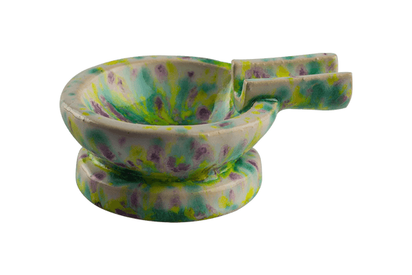 This is the Chartreuse ceramic ash tray from Jaxel's Art available at Ritual Colorado. It features an extended arm perfect for holding your joint, dynavap or whip mouthpiece. Check out all the beautiful one-of-one ceramic products from Jaxel's Art and let us know if you're ever interested in a custom creation.
