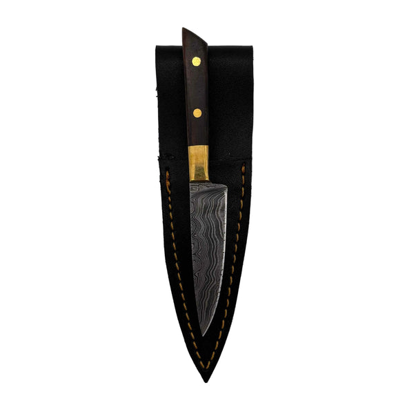 This is the Brown Wood Chef's Knife Dab Tool from Dabmascus available at Ritual Colorado. It features a two-pin handle and high-quality Damascus Steel blade for a truly unique and special dab tool made here in the U.S.