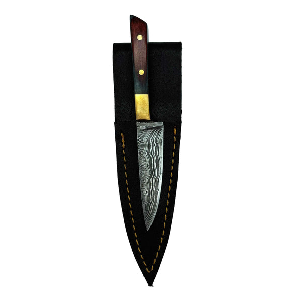 This is the Green Wood Chef's Knife Dab Tool from Dabmascus available at Ritual Colorado. It features a two-pin handle and high-quality Damascus Steel blade for a truly unique and special dab tool made here in the U.S.