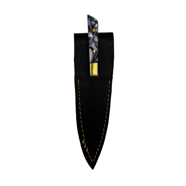 This is the Greyscale Chef's Knife Dab Tool from Dabmascus available at Ritual Colorado. It features a two-pin handle and high-quality Damascus Steel blade for a truly unique and special dab tool made here in the U.S.