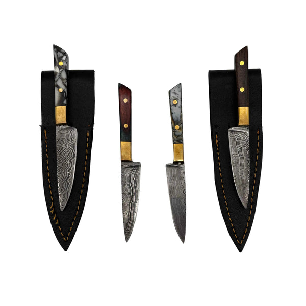 These are Chef's Knife Dab Tools from Dabmascus available at Ritual Colorado. Featuring two-pin handles and high-quality Damascus Steel blade for a truly unique and special dab tool made here in the U.S.