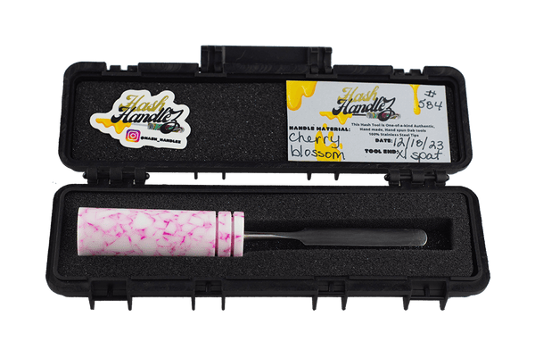This is the Cherry Blossom dab tool from Hash Handlez available at Ritual Colorado. Each includes a beautiful resin dab tool, protective hard case, and a hand-written card. Check out these locally Denver-made dabber tools today!