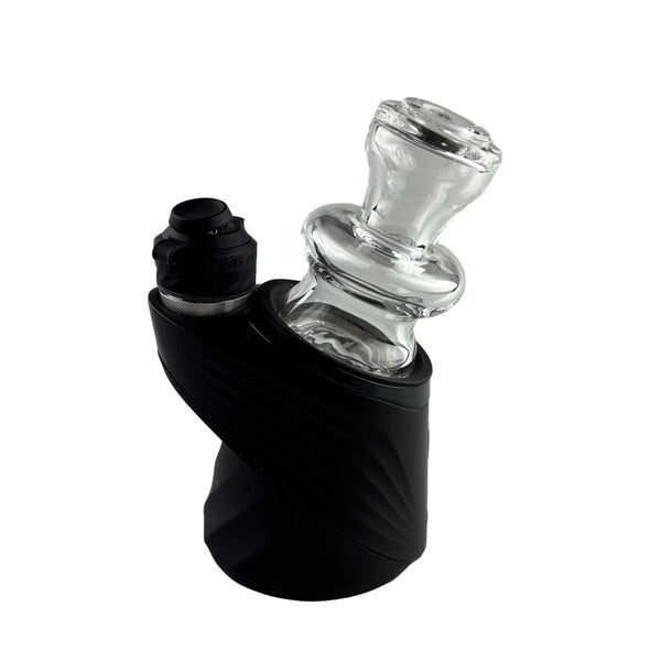 These are Clear Puffco Peak Glass Dry Tops by Technicolor Tony available at Ritual Colorado. Featuring sleek shapes in crisp clear glass these are a stylish glass upgrade for your erig.