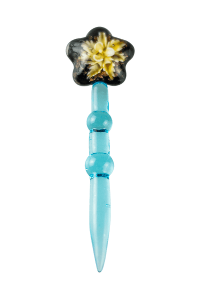 This is the Flower Glass Dabber available at Ritual Colorado. A beautiful all glass dab tool featuring an encased flower in the top for a beautiful touch.