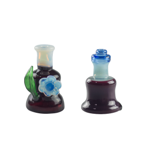 These are Dark Phoenix Peak Dry Tops by Technicolor Tony available at Ritual Colorado. Featuring colorful accent mouthpieces and details these are a sweet upgrade for your Puffco Peak or Peak Pro.