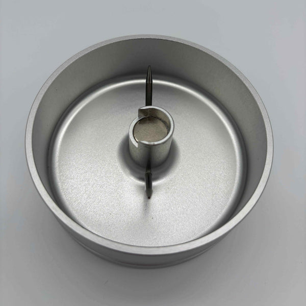 This is the Silver Spiked Debowler Ashtray by Ritual Co. available at Ritual Colorado. Featuring two spikes for easy cleaning of your bowl, a large material gathering area in the base, and a magnet in the center for easy storage of your stick vaporizer. 