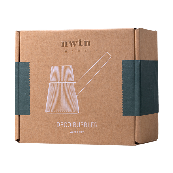 This is the Emerald Deco Bubbler by NWTN Home available at Ritual Colorado. A beautiful, Art Deco inspired glass piece with an included 14mm slide for sleek sessions.