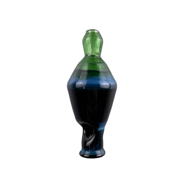 This is the Diamond Pivot Top by Biting Glass available at Ritual Colorado. A sleek handmade glass top featuring circulating airflow for your terp pearls and a bold style.