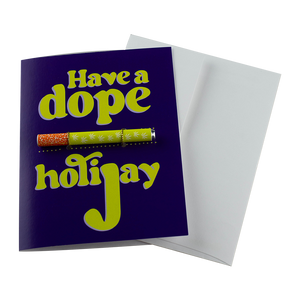 The "Have A Dope Holijay" Greeting Card by KushKards with matching metal One Hitter available at Ritual Colorado. A fun cannabis-themed way to celebrate the holidays and fun gift for the stoner in your life.
