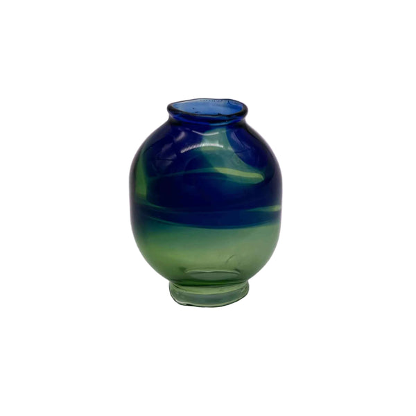 This is the Emerald / Cobalt Color Swirl Glass Macrame Bead by Biting Glass available at Ritual Colorado. Handmade in Denver, CO and featuring vibrant combinations of glass colors these beads are the perfect accent to your project.