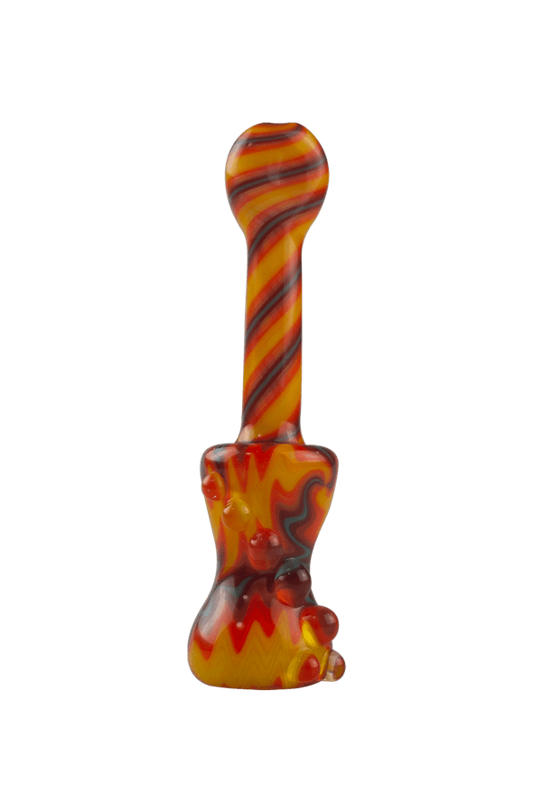 This is the Fire Wig Wag Chillum by Vulcan Glass Art available at Ritual Colorado. A beautiful classic one-hitter with detailed line work made in Buena Vista Colorado.