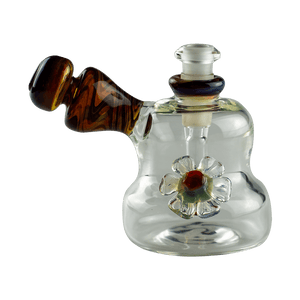 This is the Ghost Flower Bub by Technicolor Tonys available at Ritual Colorado. A conveniently portable heady bubbler that features a ghost flower and wood mouthpiece and accents.