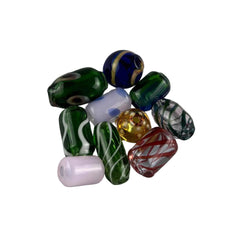 These are Handmade Glass Beads by Biting Glass available at Ritual Colorado. Featuring hand drawn patterns these tube-shaped beads are perfect to string onto a necklace, bracelet or to use as a dred bead.