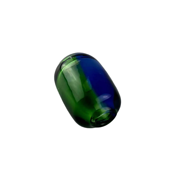 This is a Handmade Glass Bead by Biting Glass available at Ritual Colorado. Featuring hand drawn patterns these tube-shaped beads are perfect to string onto a necklace, bracelet or to use as a dred bead.