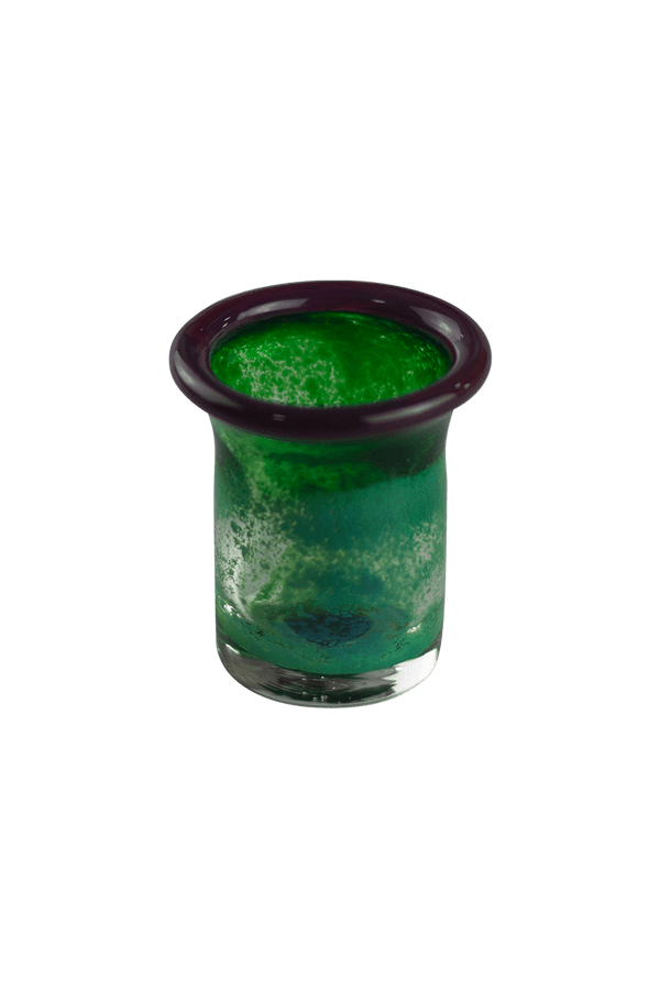 These are handmade green shot glasses by Technicolor Tony available at Ritual Colorado. Made in Denver, Colorado these vibrant glasses are the perfect addition to your barware.