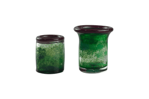 These are handmade green shot glasses by Technicolor Tony available at Ritual Colorado. Made in Denver, Colorado these vibrant glasses are the perfect addition to your barware.