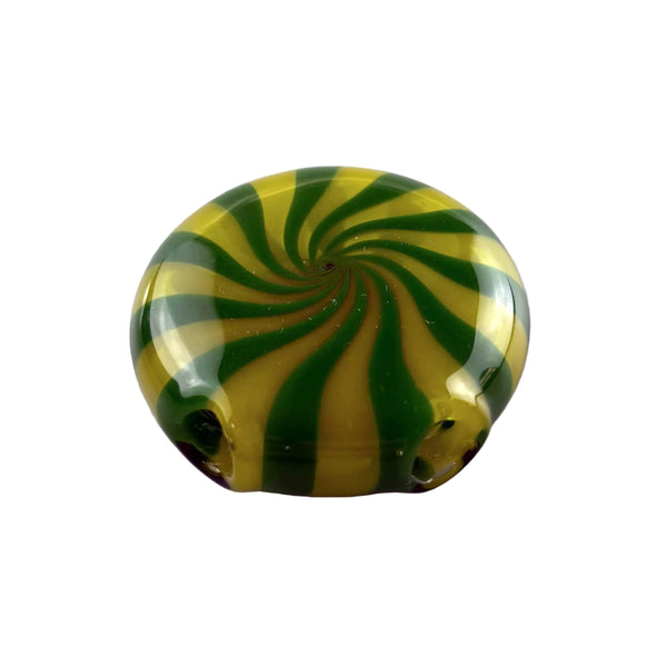 This is the Green / Red Spiral Disc Pendant by Technicolor Tony available at Ritual Colorado. A vibrant glass jewelry piece featuring intricate patterns and vibrant glass colors.