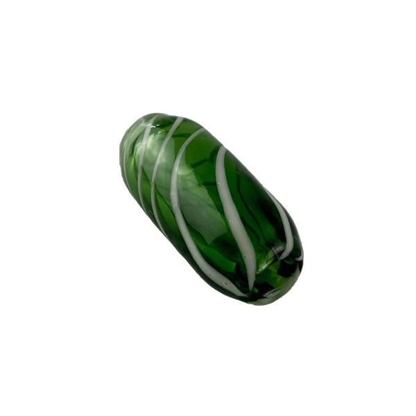 This is a Handmade Glass Bead by Biting Glass available at Ritual Colorado. Featuring hand drawn patterns these tube-shaped beads are perfect to string onto a necklace, bracelet or to use as a dred bead.