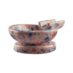 This is the Gumball ceramic ash tray from Jaxel's Art available at Ritual Colorado. It features an extended arm perfect for holding your joint, dynavap or whip mouthpiece. Check out all the beautiful one-of-one ceramic products from Jaxel's Art and let us know if you're ever interested in a custom creation.