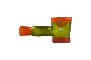 This is the Orange & Green Pipe by Technicolor Tony available at Ritual Colorado. A sleek handblown glass pipe featuring vibrant transparent green and orange glass.