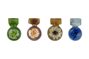 These are Flower Medallion Pendants by Biting Glass available at Ritual Colorado. A beautiful handmade borosilicate jewelry piece with hidden sparkly details. 
