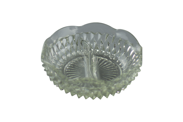 This is an Indiana Glass Vintage Diamond Point Glass Dish from Heady Vintage available at Ritual Colorado. The beautiful clear glass features eight indents around the body for convenient storage of your joints, dry herb vaporizers and dab gear. 