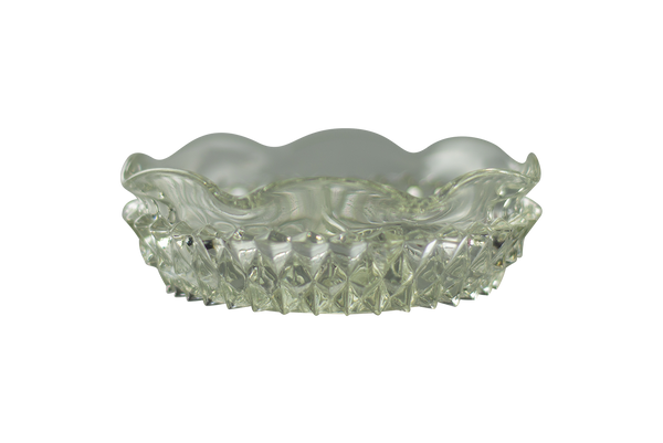 This is an Indiana Glass Vintage Diamond Point Glass Dish from Heady Vintage available at Ritual Colorado. The beautiful clear glass features eight indents around the body for convenient storage of your joints, dry herb vaporizers and dab gear. 