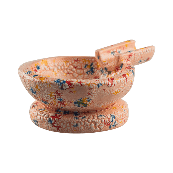 This is the Jawbreaker ceramic ash tray from Jaxel's Art available at Ritual Colorado. It features an extended arm perfect for holding your joint, dynavap or whip mouthpiece. Check out all the beautiful one-of-one ceramic products from Jaxel's Art and let us know if you're ever interested in a custom creation.
