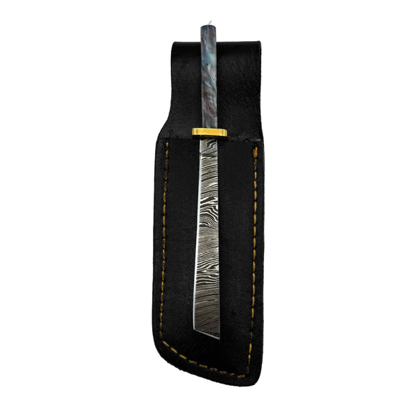 This is the Silver Swirl damascus steel Straight Katana dab tool from Dabmascus available at Ritual Colorado. Featuring intricate steel patterns on the blade accented by handmade handles with vibrant swirling colors.