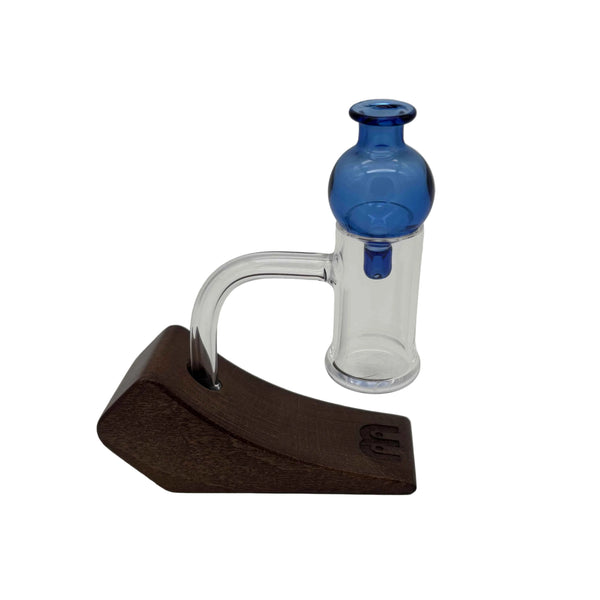 This is the Blue Classic Bubble Cap - Large (26mm) by Ritual Essentials available at Ritual Colorado. Handmade in Denver, Colorado, these sleek carb caps offer directional airflow and a clean seal on bangers up to 30mm in diameter.