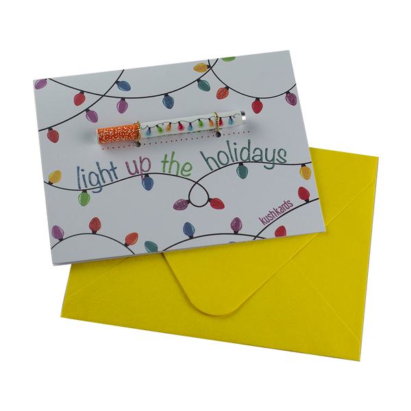 The "Light Up The Holidays" Greeting Card by KushKards with matching metal One Hitter available at Ritual Colorado. These fun greeting cards are perfect for the weed fan in your life.