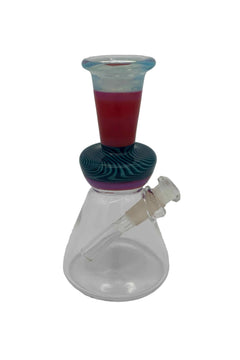 This is the Linework Mini Beaker by Technicolor Tony available at Ritual Colorado. A heady water pipe featuring a 10mm removable downstem and vibrant flared mouthpiece.