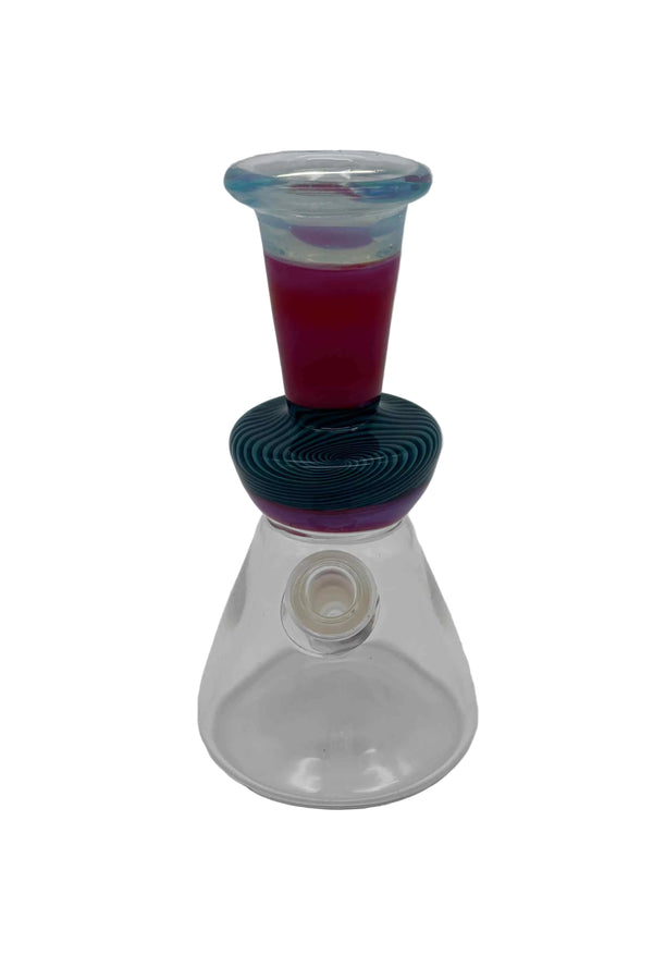 This is the Linework Mini Beaker by Technicolor Tony available at Ritual Colorado. A heady water pipe featuring a 10mm removable downstem and vibrant flared mouthpiece.