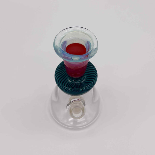 This is the Linework Mini Beaker by Technicolor Tony available at Ritual Colorado. A heady water pipe featuring a 10mm removable downstem and vibrant flared mouthpiece.