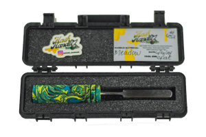 This is the Meadow dab tool from Hash Handlez available at Ritual Colorado. This beautiful dabber features a vibrant resin handle and protective hard case for easy transportation.