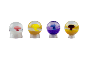 This is a set of Colorful Mushroom Marbles by Biting Glass available at Ritual Colorado. Featuring a vibrant mushroom with complementary color backing and fully handmade from borosilicate glass.
