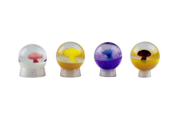This is a set of Colorful Mushroom Marbles by Biting Glass available at Ritual Colorado. Featuring a vibrant mushroom with complementary color backing and fully handmade from borosilicate glass.