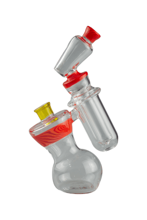 This is the Orange Swirl Double Bubbler by Technicolor Tony available at Ritual Colorado. A heady handmade glass water piece featuring two separate bubbling chambers for maximum filtration.