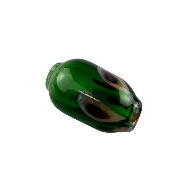 This is a Handmade Glass Bead by Biting Glass available at Ritual Colorado. Featuring hand drawn patterns these tube-shaped beads are perfect to string onto a necklace, bracelet or to use as a dred bead.