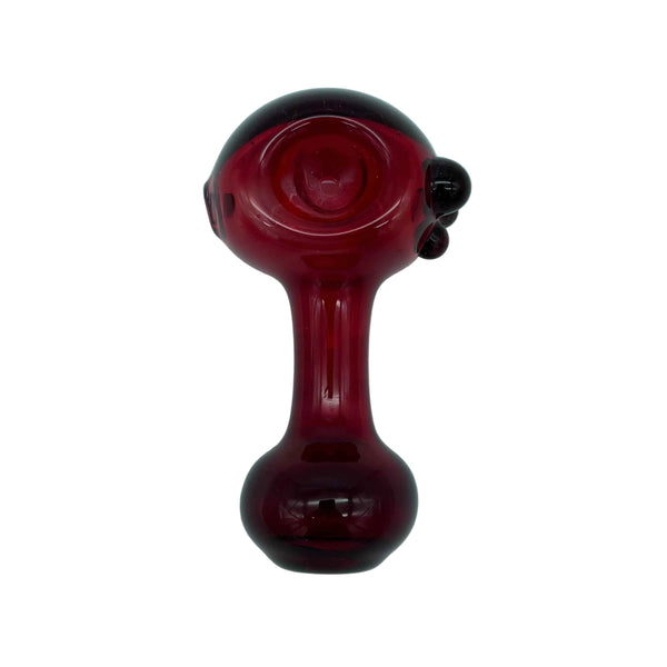 This is the Phoenix Spoon Pipe by Technicolor Tony available at Ritual Colorado. A sleek handmade glass pipe featuring a vibrant red color in an easily handheld shape.