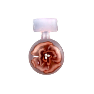 This is the Pink Flower Pendant by Biting Glass available at Ritual Colorado. A stylish handmade glass piece of jewelry featuring a vibrant red, white and pink flower.