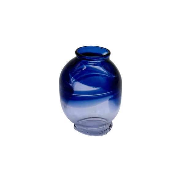This is the Purple / Cobalt Color Swirl Glass Macrame Bead by Biting Glass available at Ritual Colorado. Handmade in Denver, CO and featuring vibrant combinations of glass colors these beads are the perfect accent to your project.