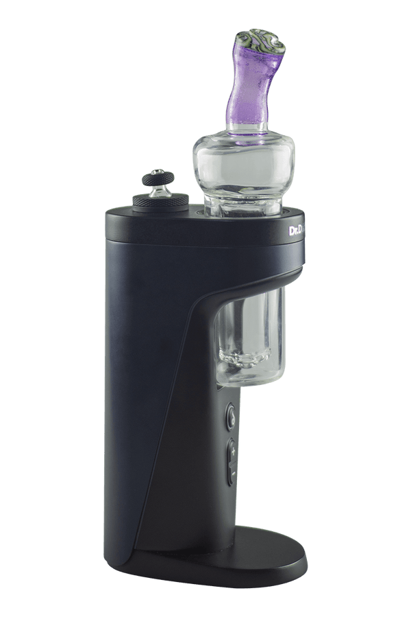 This is the Purple & Green Shredder Glass Switch 2 Top by Technicolor Tony available at Ritual Colorado. These handmade glass upgrades for your Dr. Dabber eRig include a 4-hole perc and stylish designs. 
