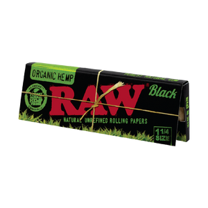 These are RAW Organic Black Rolling Papers (1 1/4" Size) by RAW available at Ritual Colorado. Made from organic hemp these are refined and ultra-thin papers for a premium burn.