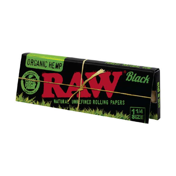 These are RAW Organic Black Rolling Papers (1 1/4" Size) by RAW available at Ritual Colorado. Made from organic hemp these are refined and ultra-thin papers for a premium burn.